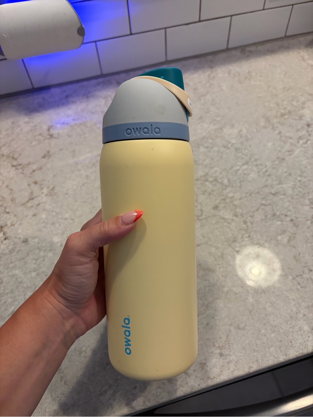 Owala Stainless Water Bottle in Butter Yellow & Teal